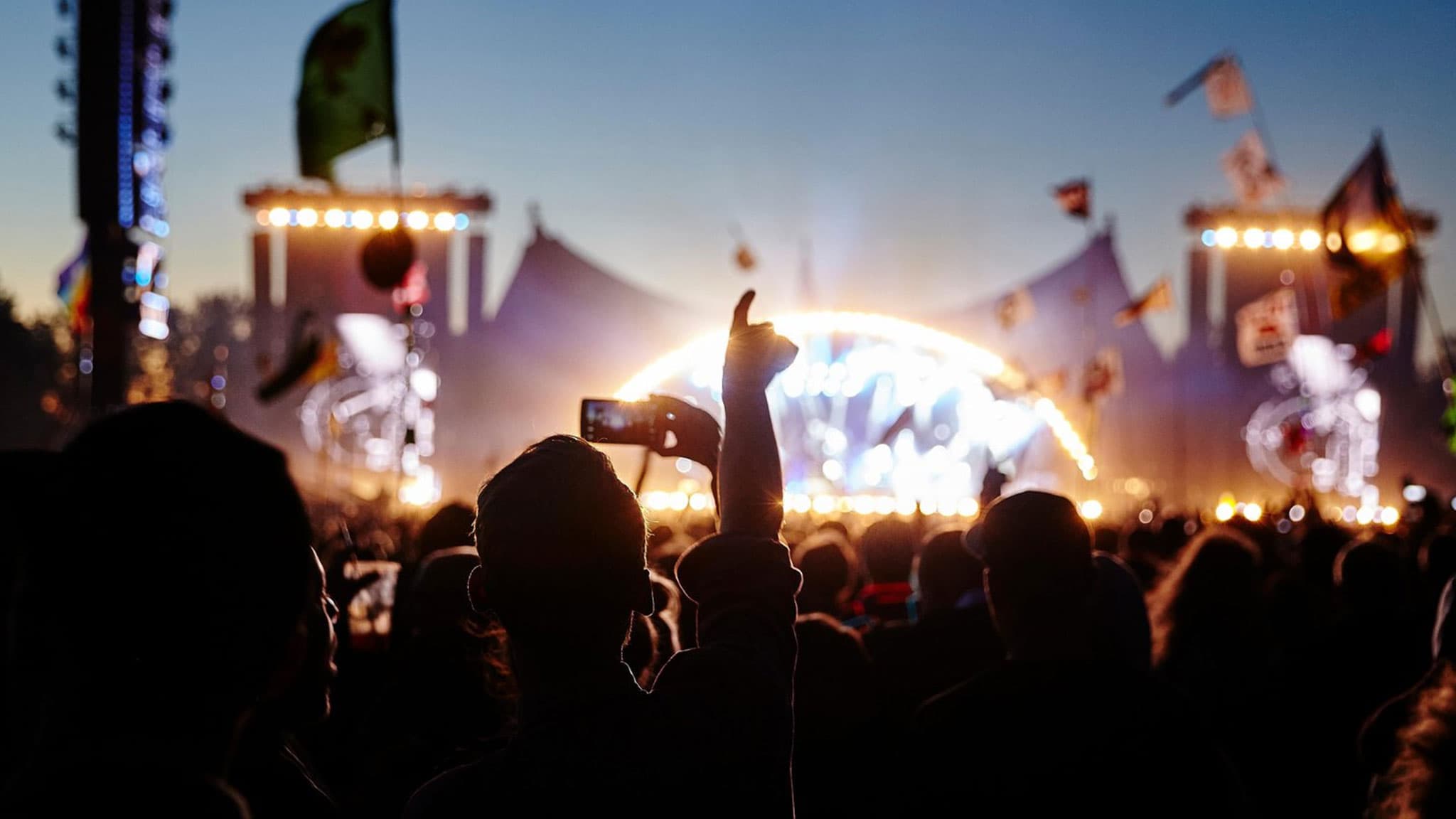 Roskilde Festival — crowd and main stage at dusk